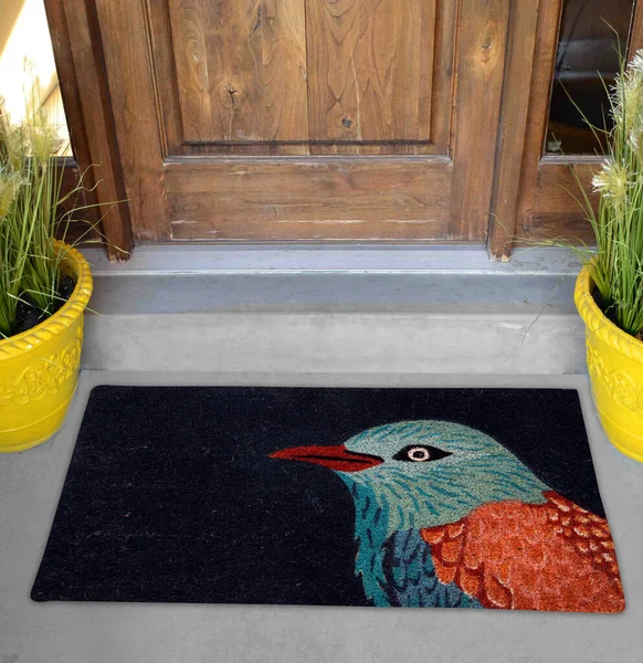 Modern Black Kingfisher bird printed zute doormat outside home with yellow flowers and leaves