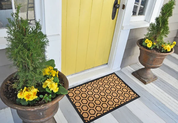 Modern Honeycomb design peach color doormat with black border Placed outside door