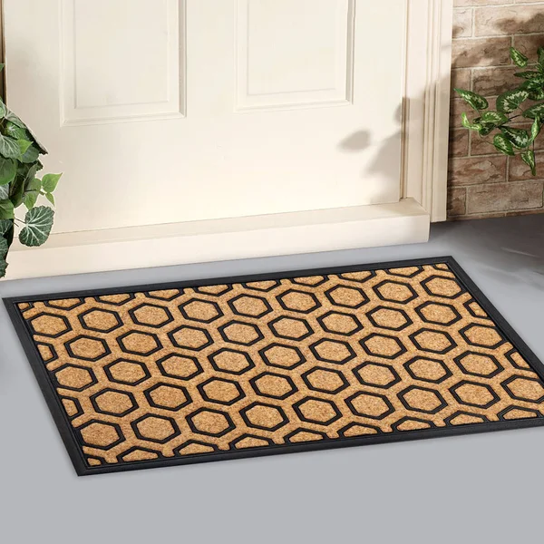Modern Honeycomb design peach color doormat with black border Placed outside door