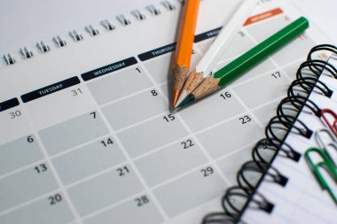 Indian Flag colour pencils on calendar 15th of August - Indian independence day / India celebrates independence day
