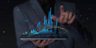 Man Hand Holding Tablet with Virtual Statistic Bars, social media marketing image, online marketing image