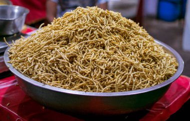 Yellow color deep fried Ratlami sev spicy Indian snack made from chickpea flour