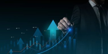 Financial charts showing growing revenue on touch screen, finance images