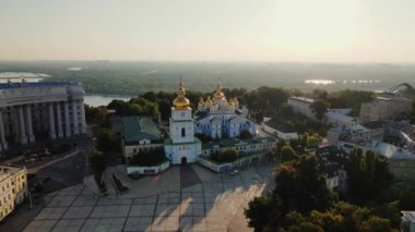 Aerial view. Michaels Golden-Domed Monastery on Mikhailovskaya Square in Kiev at Sunrise. Historical center of Kiev. High quality 4k footage