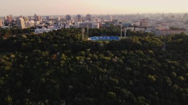 KYIV, UKRAINE - August 10, 2021. Dynamo Kyiv Lobanovskyi Stadium Aerial view. Drone footage of Kyiv city center at Sunset. High quality 4k footage