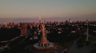 Fly around Motherland Monument at dawn in Kyiv, Ukraine. Cinematic Drone footage. High quality 4k footage
