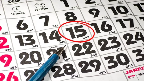 Red circle marked with pen on a calendar sheet