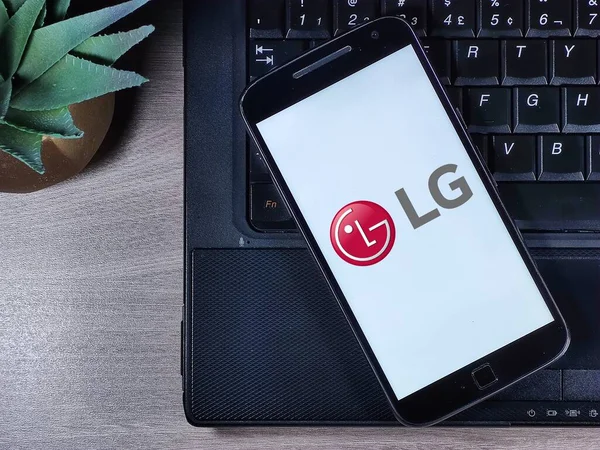 stock image Smartphone with LG Electronics logo on the screen. Lucky Goldstar.