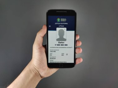 Başvuru e-Ttulo - Brezilya Yüksek Seçim Mahkemesi. E-Ttulo do Brasil uygulamalı çapraz cep telefonu..