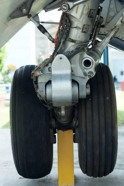 Close-up view of wheel well or landing gear of an old aircraft
