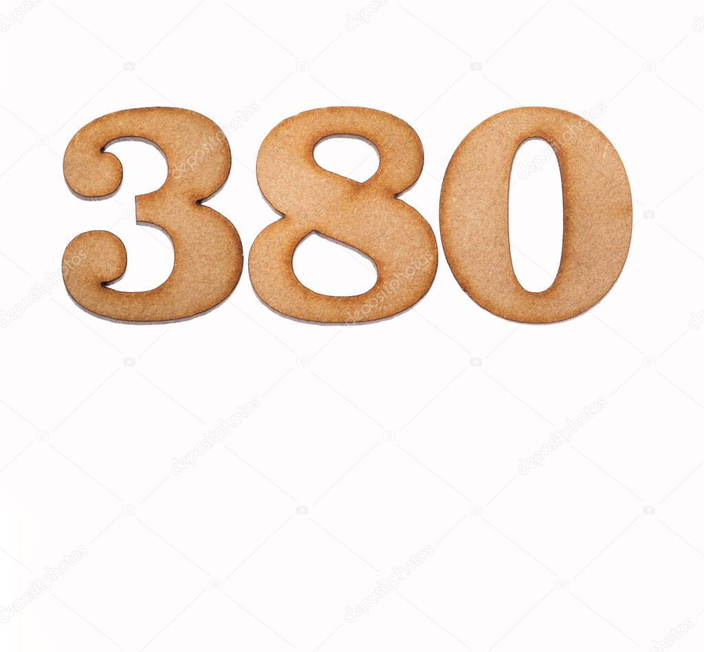 Number 380 in wood, isolated on white background