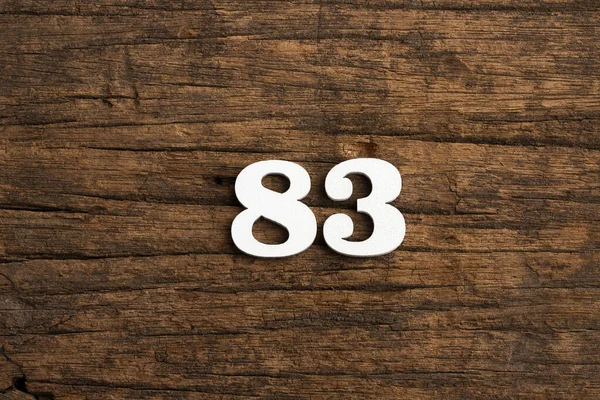 Numer Kawałek Rustykalnym Tle Drewna — Zdjęcie stockowe