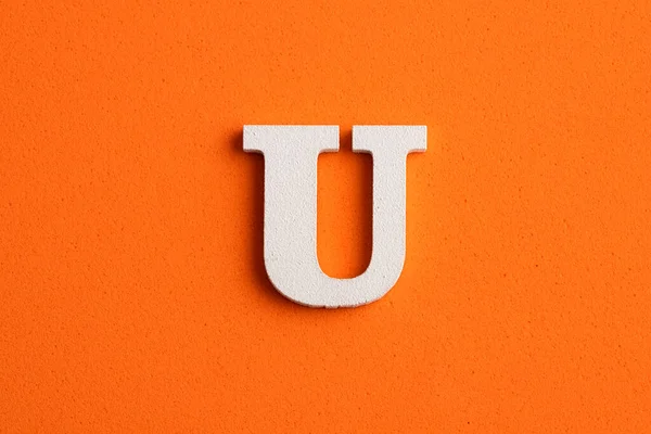 White Wooden Capital Letter Orange Foamy Background — 스톡 사진