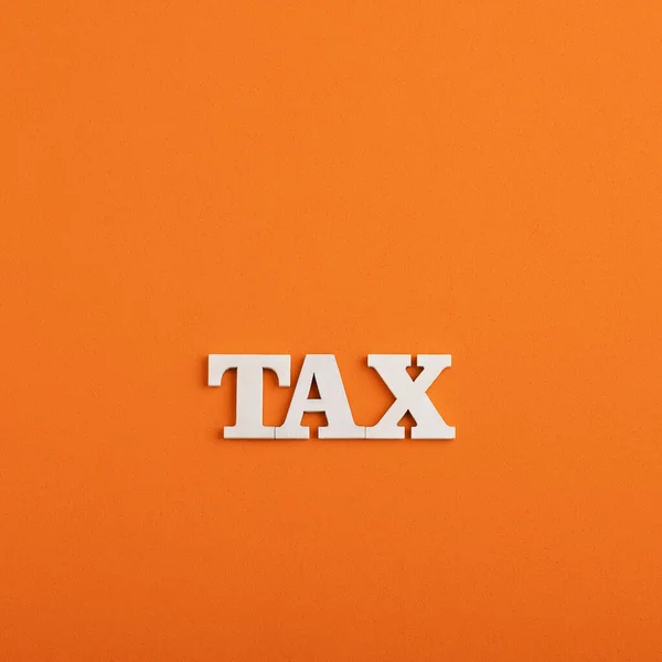 Tax Word White Letters Orange Background — Stock Photo, Image