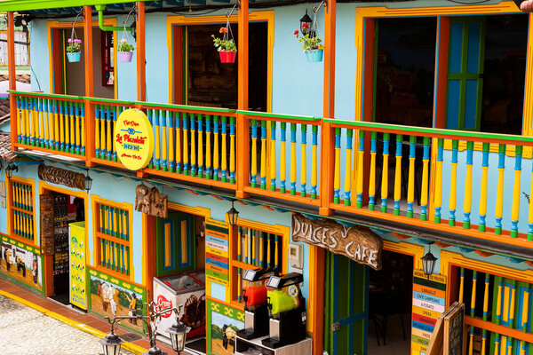 Guatape, Antioquia - Colombia - May 25, 2022. It is one of the most colorful towns in Colombia, it reflects it in the form of baseboards and streets full of life.