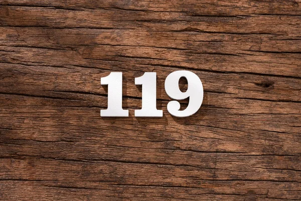 Číslo 119 Kus Rustikálním Dřevěném Pozadí — Stock fotografie