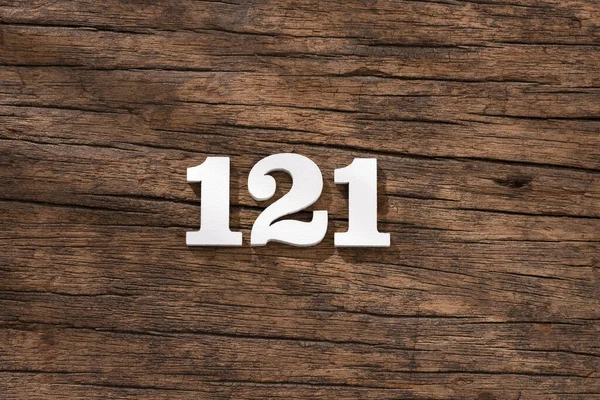 Номер 121 Кусок Деревенском Фоне Дерева — стоковое фото