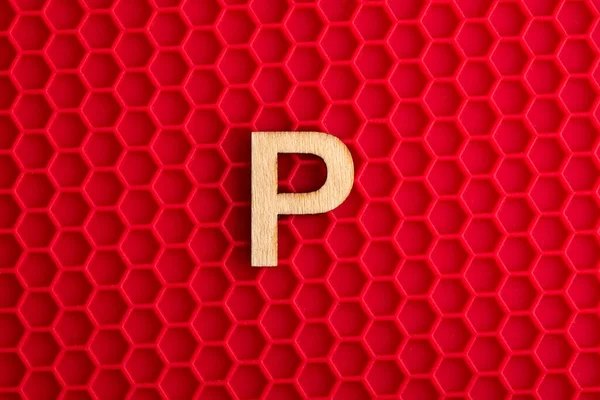 Capital Letter White Piece Silicone Background Red Hexagons — Fotografia de Stock