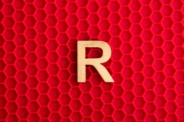 Capital Letter White Piece Silicone Background Red Hexagons — Foto Stock