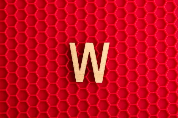 Alphabet Letter White Piece Silicone Background Red Hexagons — 스톡 사진