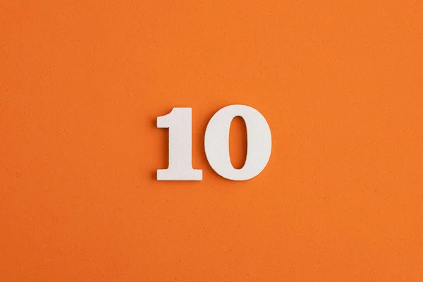 White Wooden Number Eva Rubber Orange Background — Stock Fotó