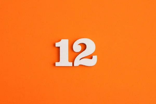 White Wooden Number Eva Rubber Orange Background — Φωτογραφία Αρχείου