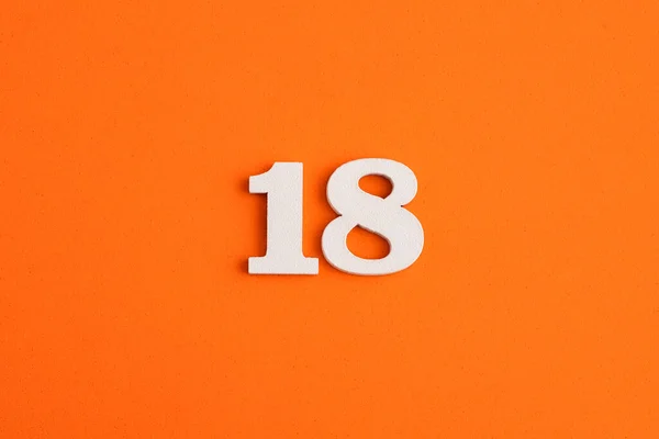 White Wooden Number Eva Rubber Orange Background — Zdjęcie stockowe