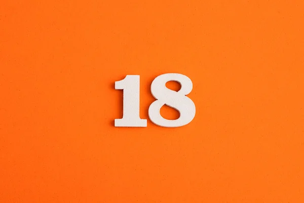 White Wooden Number Eva Rubber Orange Background — Φωτογραφία Αρχείου