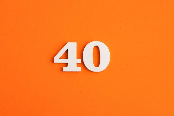 White Wooden Number Eva Rubber Orange Background — Zdjęcie stockowe