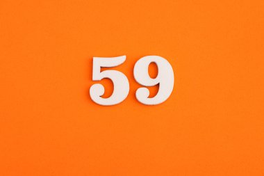 Number 59 - On orange foam rubber background