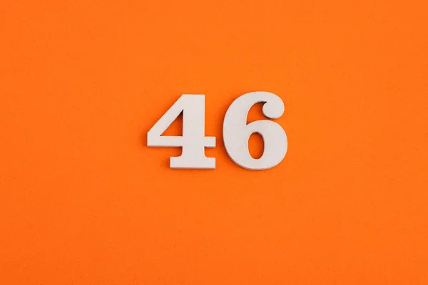 White Wooden Number Eva Rubber Orange Background — Zdjęcie stockowe