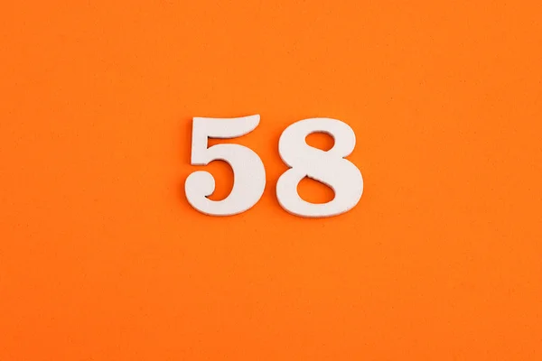 White Wooden Number Eva Rubber Orange Background — Stock fotografie