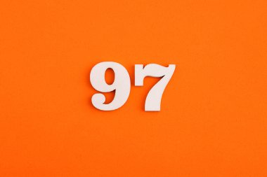 Number 97 - On orange foam rubber background
