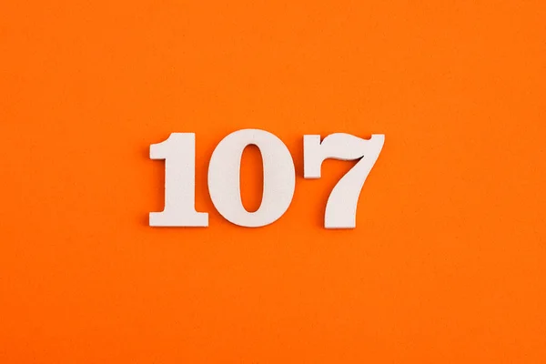 Number 107 Orange Foam Rubber Background — Stock fotografie