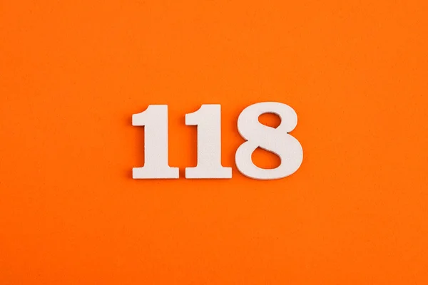 White Wooden Number 118 Eva Rubber Orange Background — Stockfoto