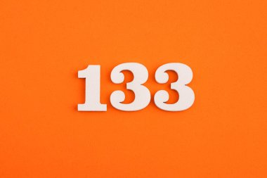 Number 133 - On orange foam rubber background