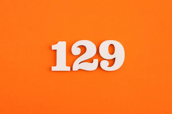 Number 129 Orange Foam Rubber Background — Foto Stock