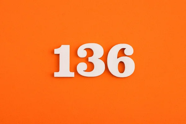 White Wooden Number 136 Eva Rubber Orange Background — Foto de Stock