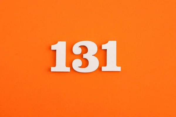 White Wooden Number 131 Eva Rubber Orange Background — Stockfoto