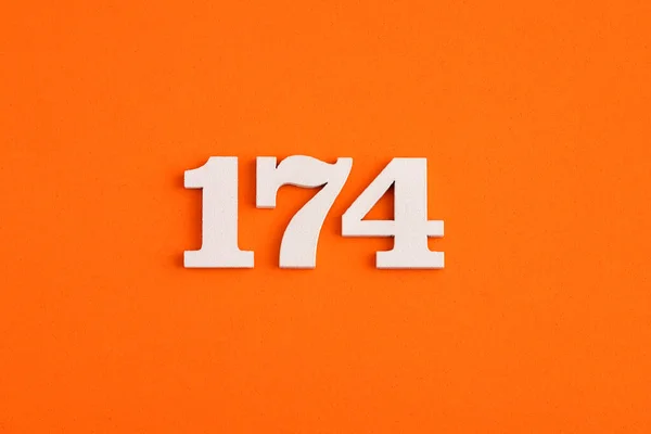 White Wooden Number 174 Eva Rubber Orange Background — Fotografia de Stock