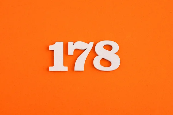 White Wooden Number 178 Eva Rubber Orange Background — Stock fotografie