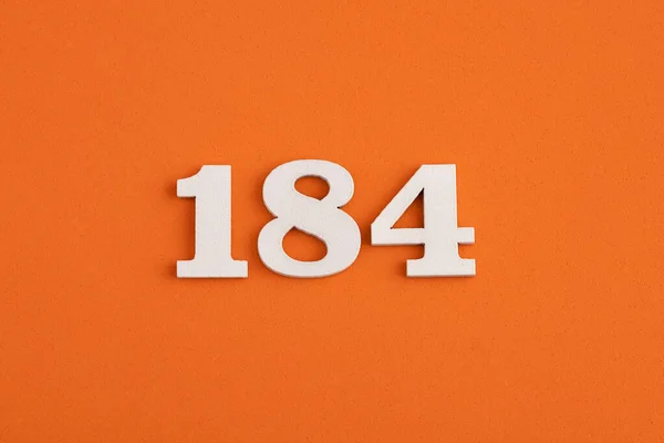 White Wooden Number 184 Eva Rubber Orange Background — Stock fotografie