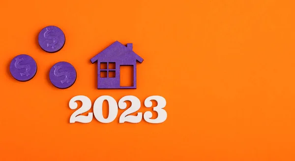 Home buying and selling concept - House and year 2023