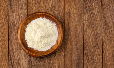 Powdered or dehydrated milk in the bowl