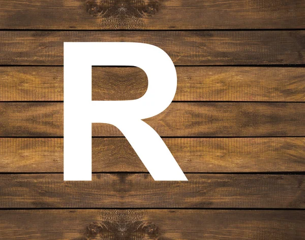 木背白孔中字母R — 图库照片