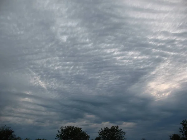 Waves of clouds in the sea of the sky. Bilhorod-Dnistrovsky district, Odesa region, Ukraine