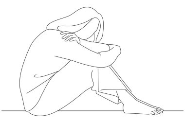 sad woman with depression sitting alone on the floor major depressive disorder. 