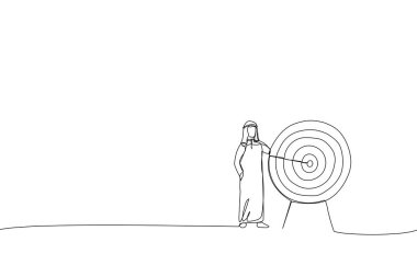 Arap iş adamının karikatürü. Tam ortasında ok olan kocaman bir hedefin yanında duruyor. Hedefe ve hedefe ulaşmak için metafor. Aralıksız satır ar