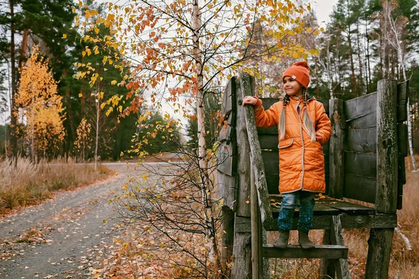 Happy Ten Years Girl Orange Coat Hat Walks Plays Handmade — 스톡 사진