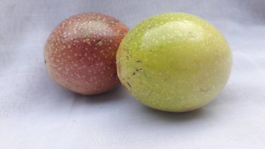 Markisa or passion fruit with orange and green colors